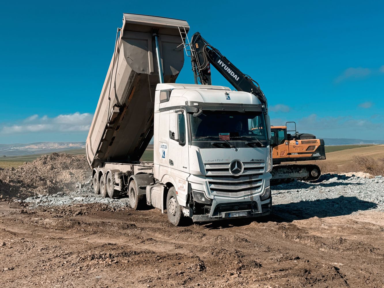 Dump truck and excavator working a Tennessee site